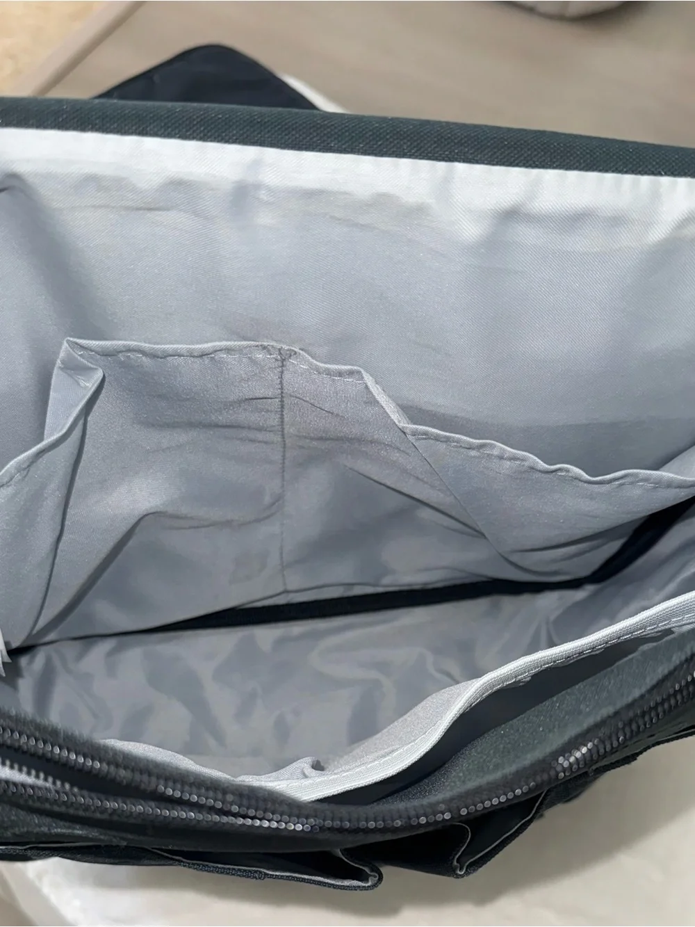 Skip Hop Black Messenger Bag with Light Blue Piping
